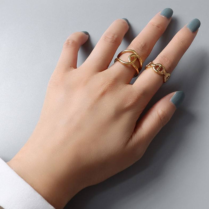 Golden modern ring with irregular circles