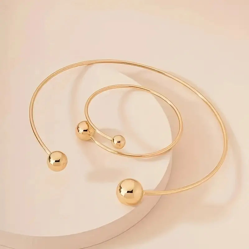 Minimalist, glowing collar and cuff bracelet set | Gold