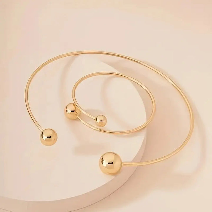 Minimalist, glowing collar and cuff bracelet set | Gold