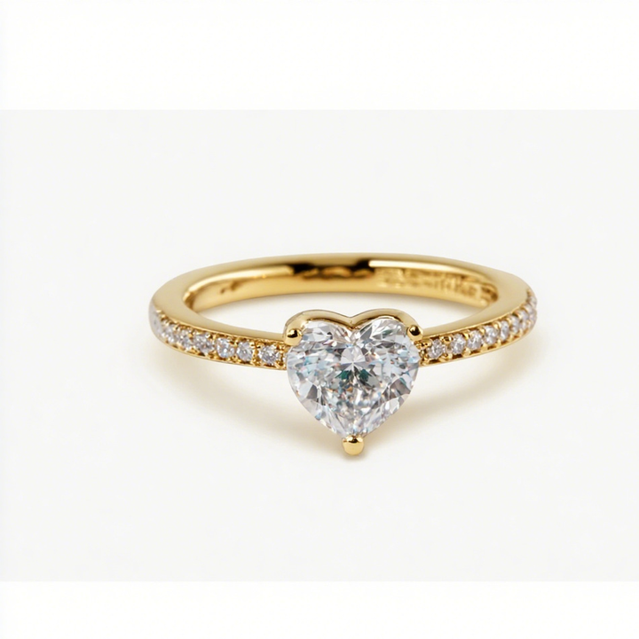 Heart-shaped gold engagement ring with zirconia