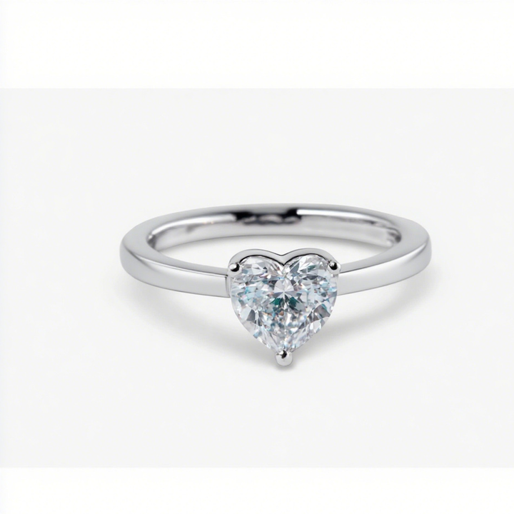 Heart-shaped gold engagement ring with zirconia